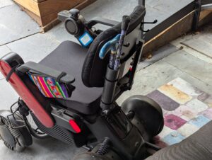 cane holder and hooks now on the back of the powerchair