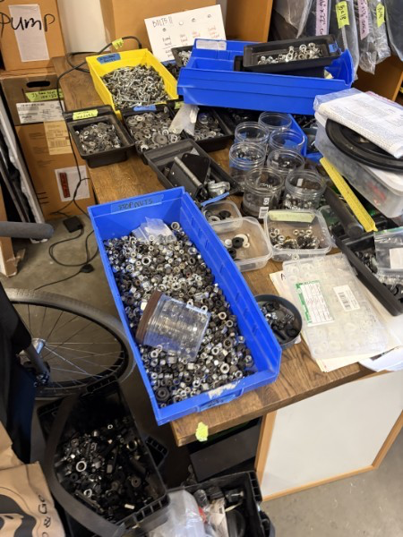 bins terrifyingly full of unsorted bolts and small parts